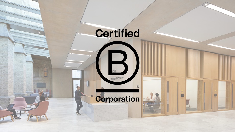 black b corp logo against a photo of an office