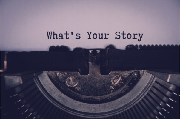 a typewriter with the words what's your story  