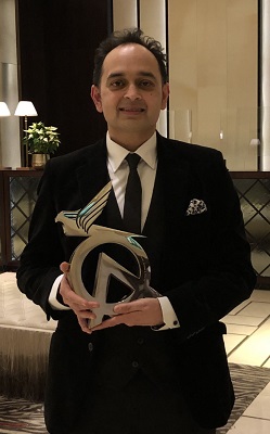 Dr Rohit Narayan with his award