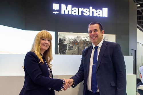 Marshall Chief Executive Officer Kathy Jenkins and Ian Muldowney, Chief Operating Officer, BAE System’s Air Sector celebrate Tempest partnership announcement on Marshall’s stand at DSEI.