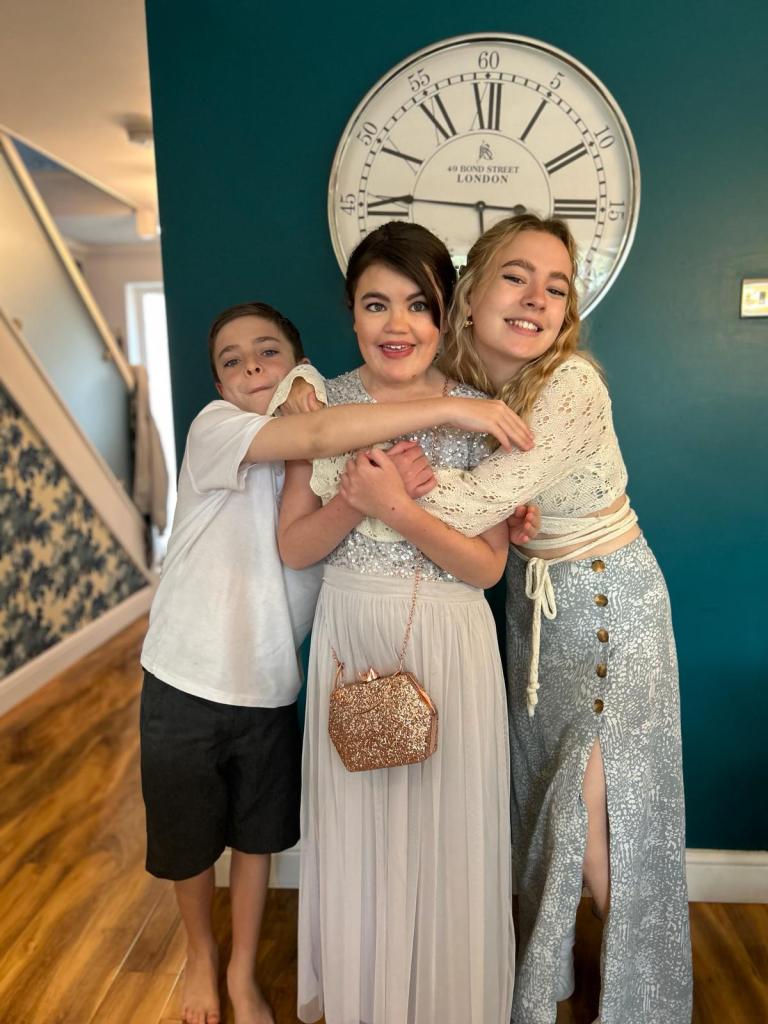 Camille before prom with her siblings
