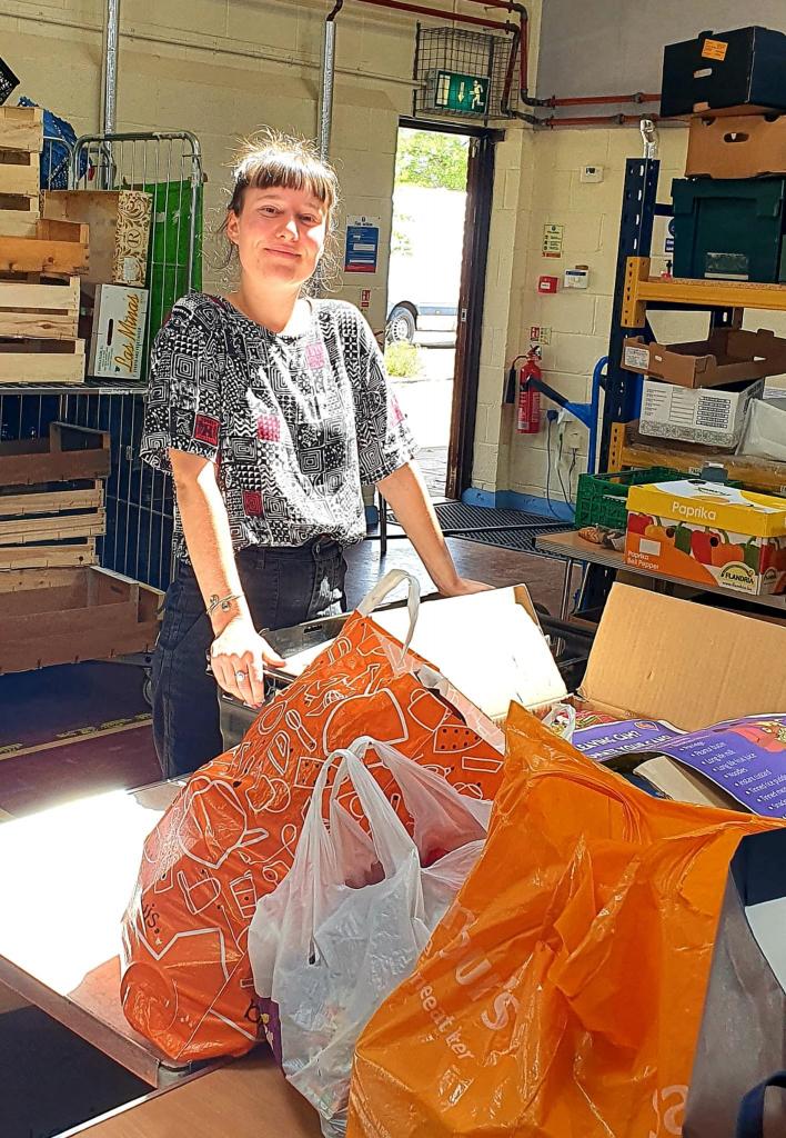 Image showing Alice delivering donations to distribution centre