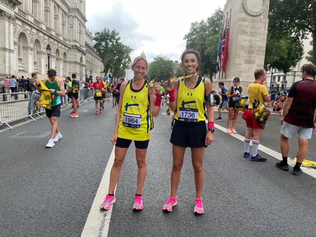 Kerry and Troi in Tom's Trust vests in the middle of a race