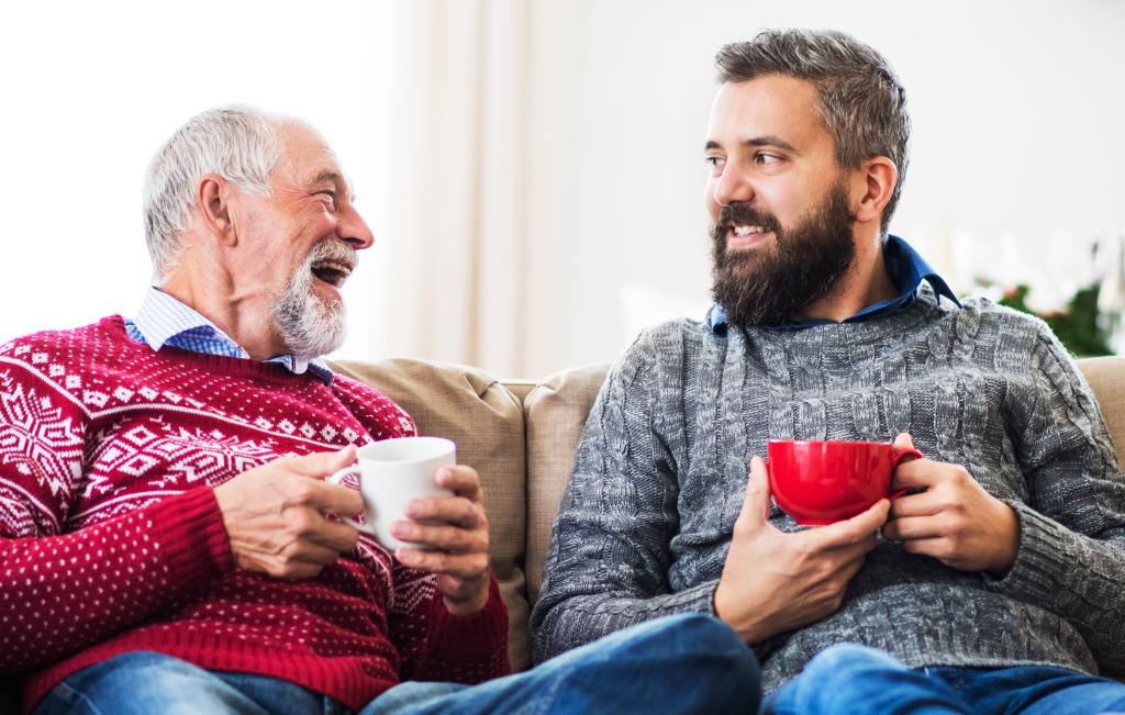 men having a cup of tea together