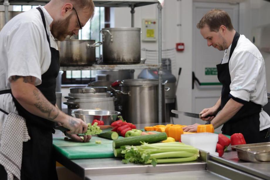 Chefs at Cambridge Dining Co preparing meals for Crossways guests