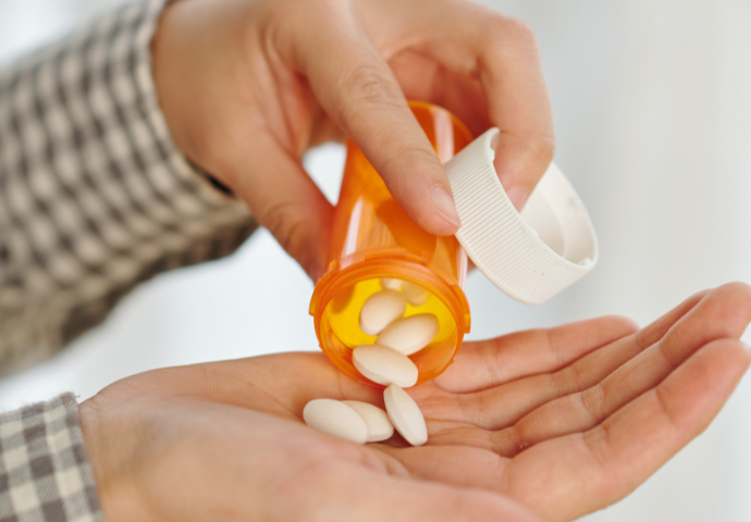 patient holding tablets 