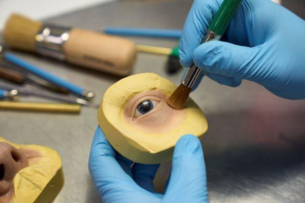 a prosthetic eye being worked on 