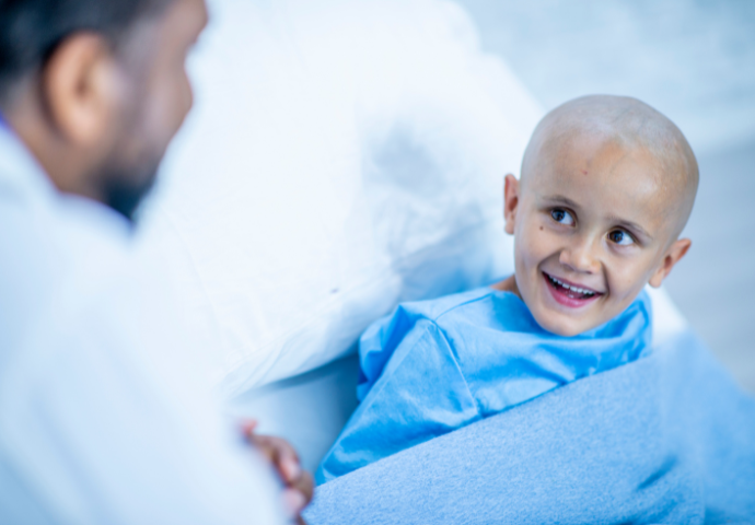 child cancer patient with doctor 