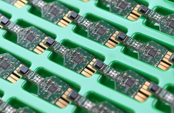 A tray showing extended PCBs for Flusso's new FSE-122 gas flow sensor module.