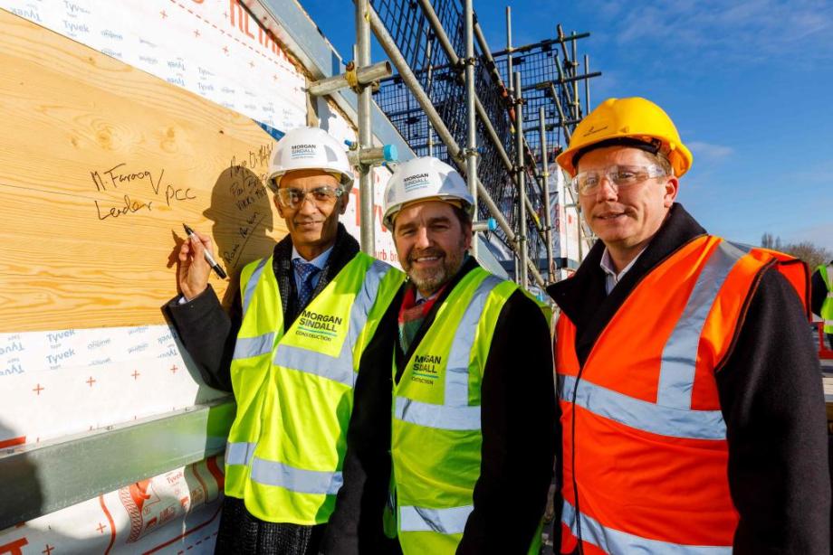 Representatives of the three partners at the recent topping out ceremony for the milestone of construction of the third phase of the university. From left Peterborough City Council leader Cllr Mohammed Farooq, Mayor Dr Nik Johnson and ARU Peterborough Principal Prof Ross Renton.