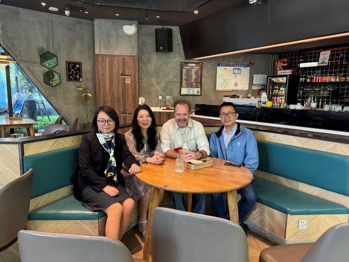 From left to right: Wency Wang, Lily Lin, Dr Paul Burrows has and Dr Wang Liang