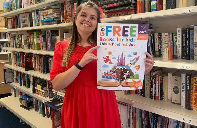 Lois with free books for kids poster EACH 