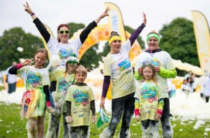 Adults and children having completed the bubble run