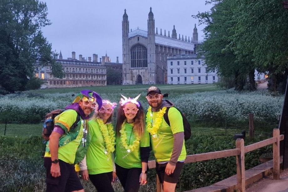 Star Shine Night Walkers stand in front of Kings College Cambridge for patients at Arthur Rank Hospice Charity 