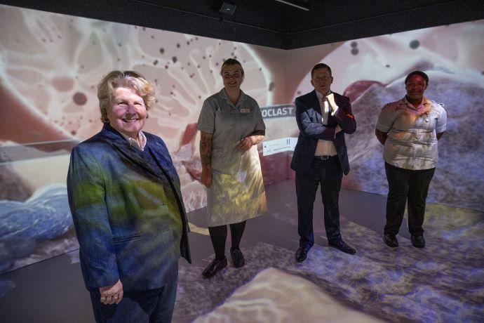 Sandi Toksvig with staff at ARU opening 