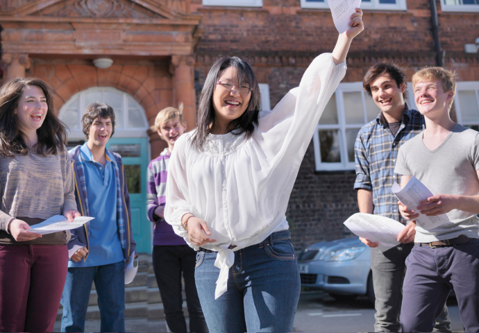 group of students receiving exam results 