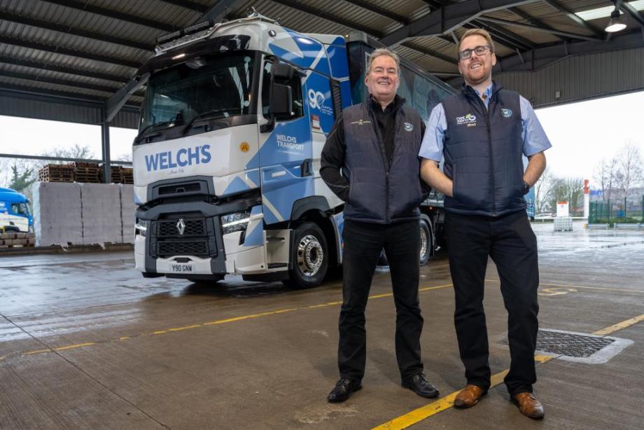 Chris Welch and Jim Welch standing in front of a Welch Group HGV