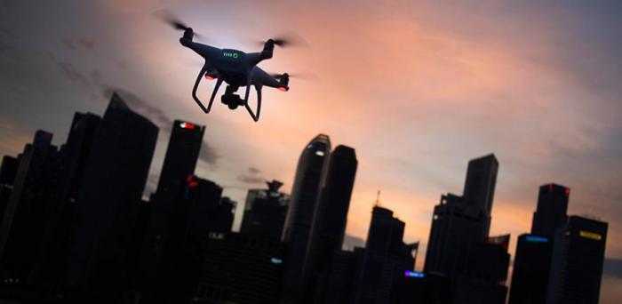   Drone and city skyline  Credit: Goh Rhy Yan via Unsplash