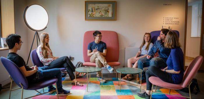 students sitting in a discussion group