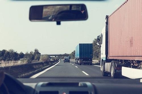Trucks on the highway -- Image by Markus Spiske from Pixabay