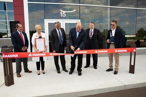 Magna officially opens its new electronics facility in Grand Blanc Township, Michigan.