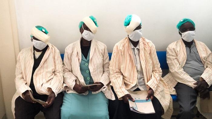 Eye patients line up in hospital