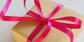 a wrapped present with red ribbon
