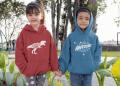 Children in ACT hoodies