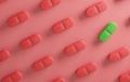 green pill among a sea of red pills