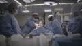 Richard Price and Animesh Patel in the operating theatre