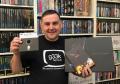  Jason Fitzpatrick with the Limted Edition backers edition of Elite Dangerous and an original 5.25" Floppy disk from the early 80s.